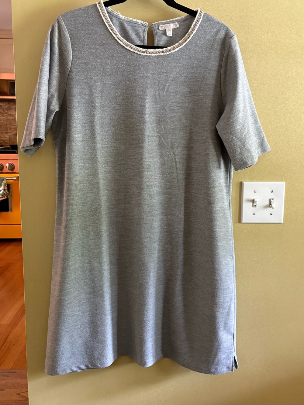 Sporty and bedazzled grey dress.  Knee length, bedazzled neckline, sassy.